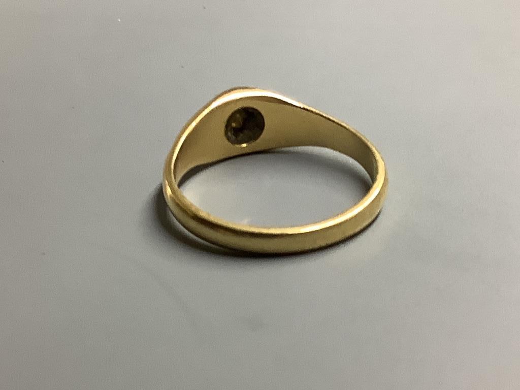 A yellow metal and claw set solitaire diamond ring, size P/Q gross 4.8 g.